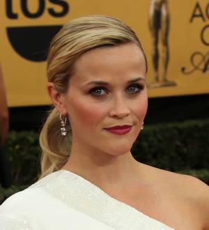 Reese Witherspoon developing Wall Street novel into comedy film