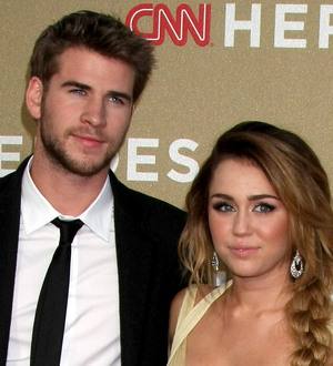 Miley Cyrus denies surgery speculation