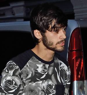 Zayn Malik thanks fans for support as he is reunited with band