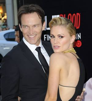 Anna Paquin poses naked with husband in a coffin for magazine cover