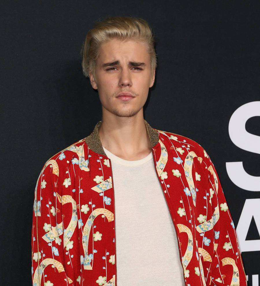 Justin Bieber presents NHS choir with chart-topping award