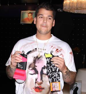 Rob Kardashian jokes about a son