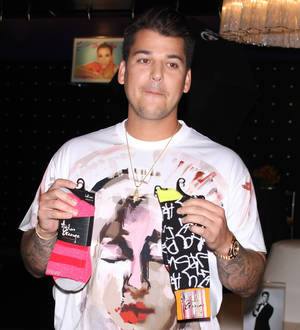 Rob Kardashian jokes about a son