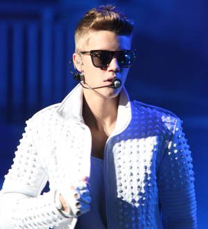Justin Bieber bundled off bicycle after casino prank