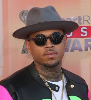 Chris Brown breaks silence on love child reports