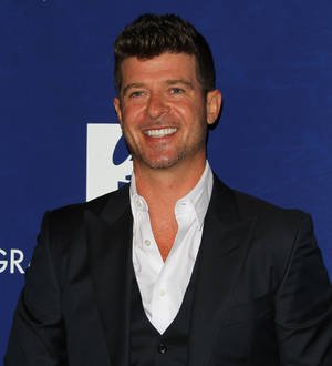Robin Thicke stunned by dad's sex song confession