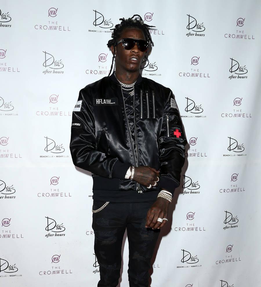 Young Thug hit with additional felony charges following arrest