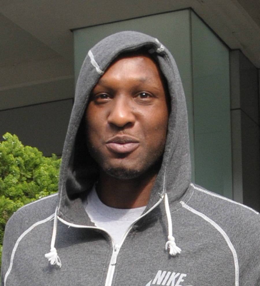 Lamar Odom wakes from coma - report