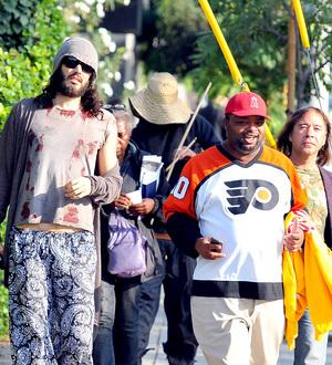 Russell Brand treats homeless group to breakfast