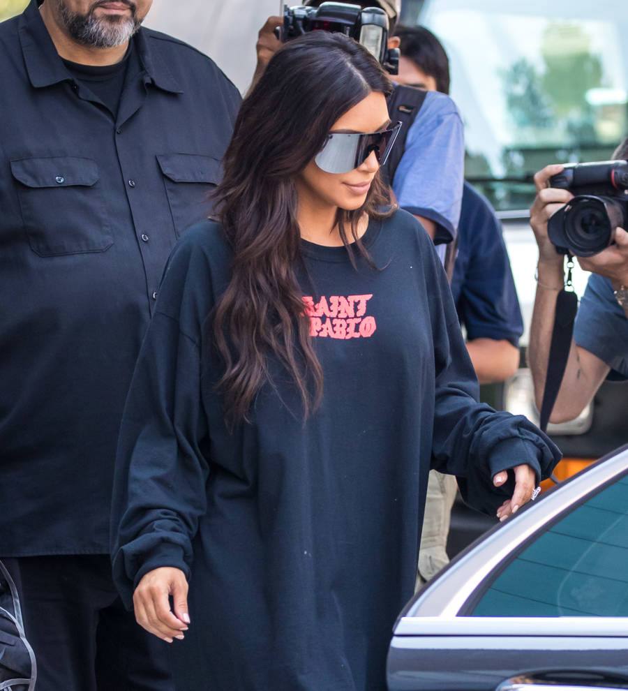 Kim Kardashian 'badly shaken' after being held at gunpoint in hotel room