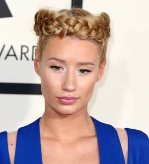 Iggy Azalea reschedules spring tour