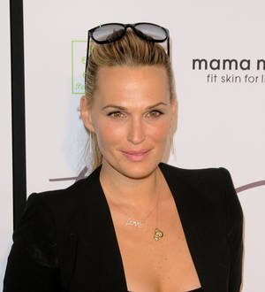 Molly Sims donating retail proceeds to Hurricane Sandy relief