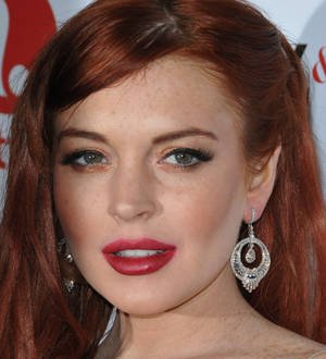 Lindsay Lohan slapped with new charges over car crash