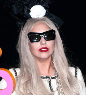 Lady Gaga mourning godfather's death