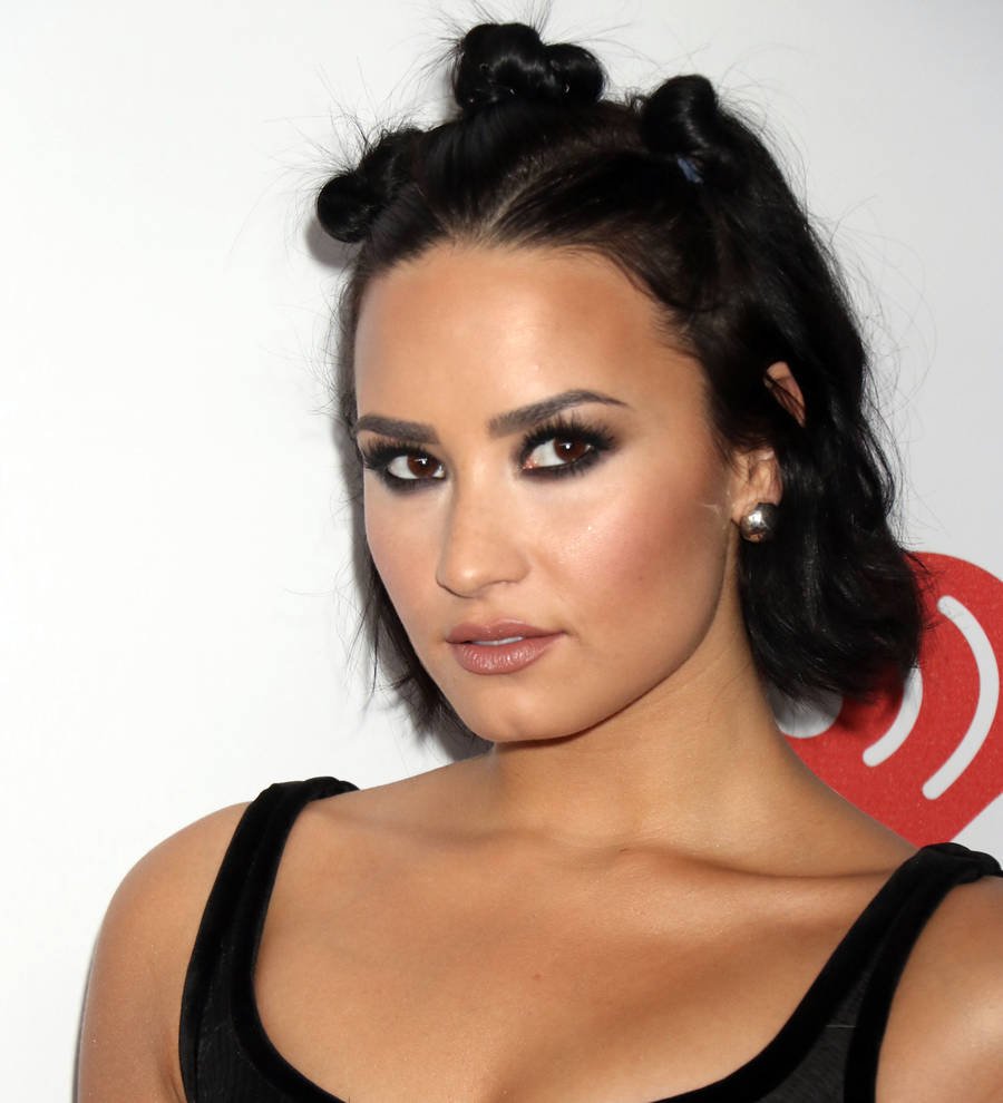 Demi Lovato's new track helped her 'process' father's death