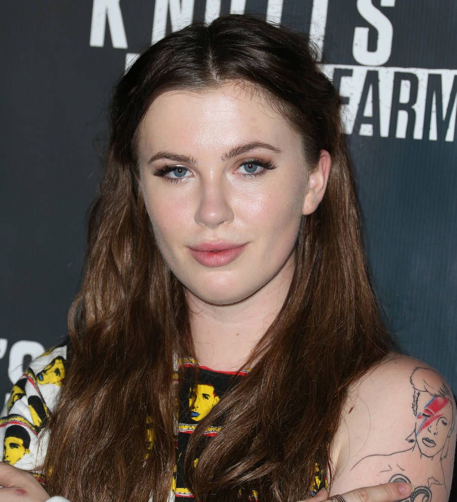 Ireland Baldwin brushes off dating rumors with dad's prying texts