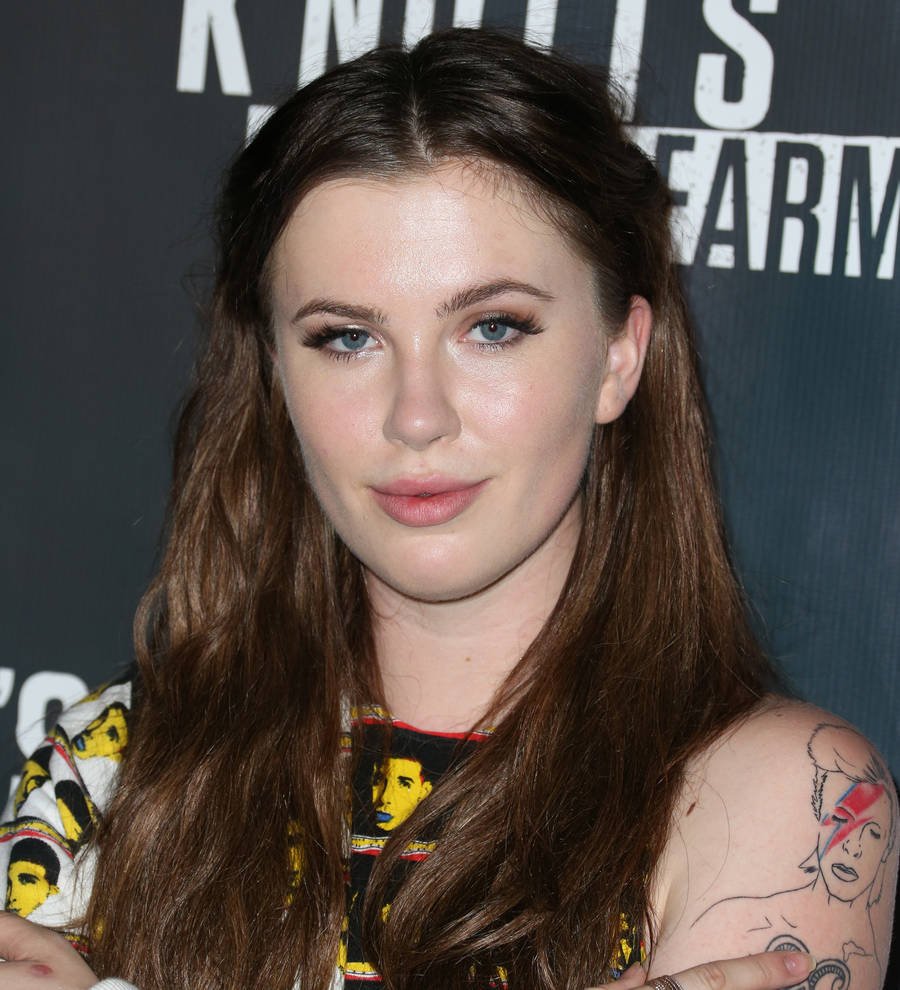 Ireland Baldwin brushes off dating rumors with dad's prying texts
