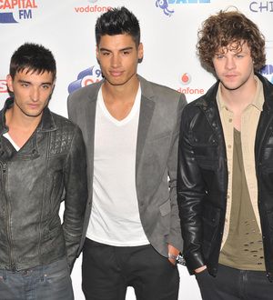 The Wanted run with Olympic torch