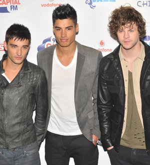 The Wanted run with Olympic torch