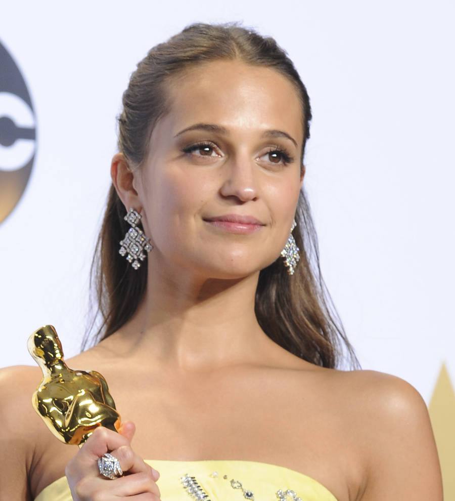 Alicia Vikander romps around in jeans and T-shirts when she doesn't have to dress up