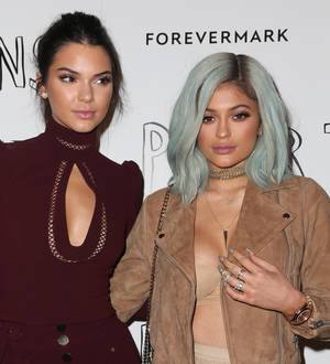 Kendall and Kylie Jenner celebrate graduation with surprise party