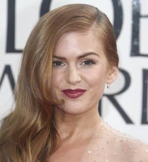 Isla Fisher refuses to keep scales at home