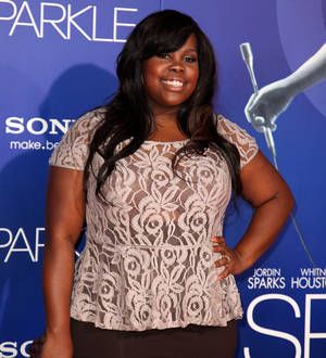 Amber Riley cries discussing body image on TV