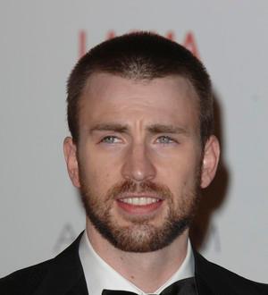 Chris Evans determined to hit the mat for yoga sessions in 2012