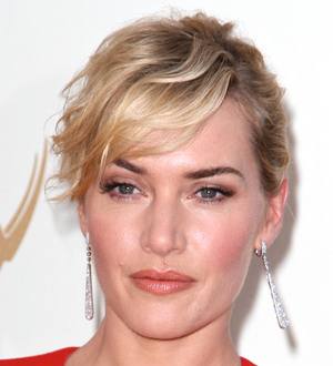 Winslet rushed to put on a bra before escaping blaze
