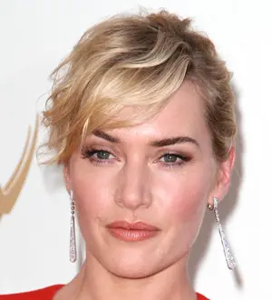 Winslet rushed to put on a bra before escaping blaze