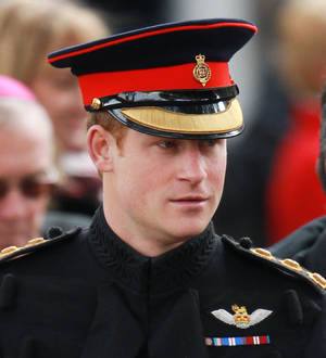 Prince Harry knighted by Queen Elizabeth II