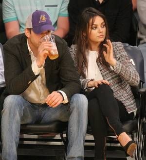 Ashton Kutcher takes mom-to-be Kunis to the ballpark on Mother's Day