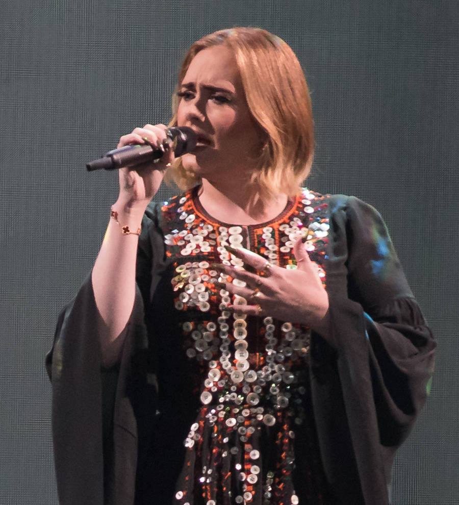 Adele invites herself to gay fans' wedding