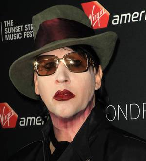 Marilyn Manson has ear re-attached following fight