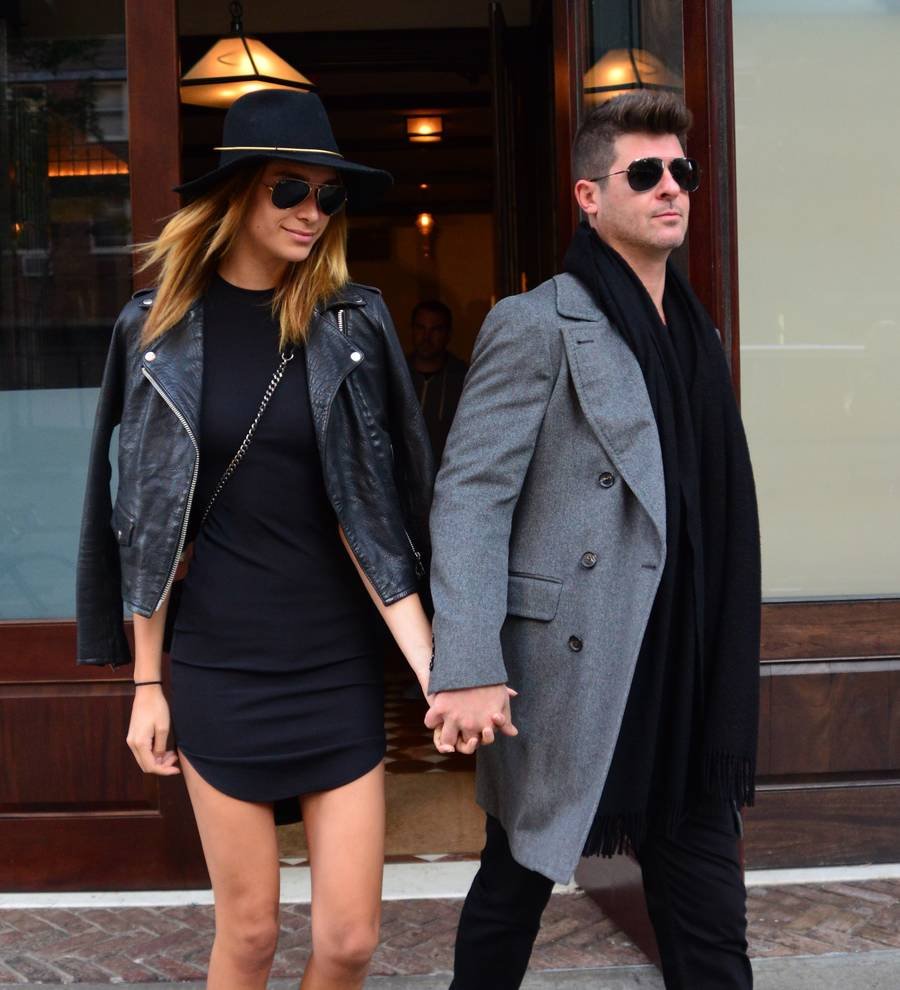 Robin Thicke's girlfriend fuels rumors the couple has wed