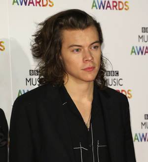 Harry Styles parties with Kristen Wiig