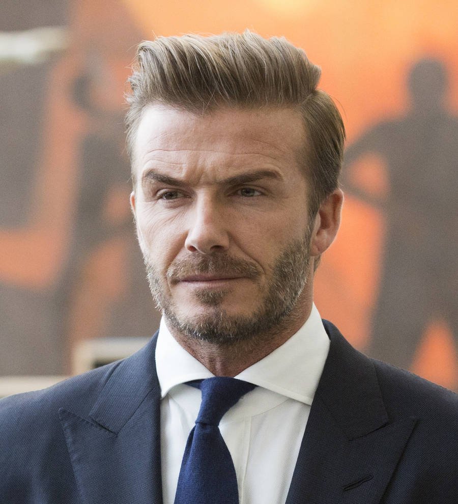 David Beckham plays soccer with earthquake survivors