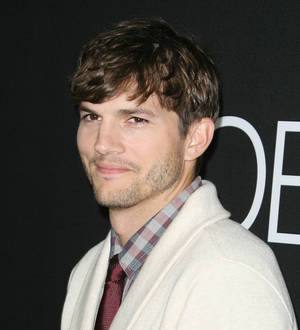 Ashton Kutcher pokes fun at Charlie Sheen on Two and a Half Men