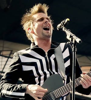 Matt Bellamy takes a tumble during Muse's Download debut