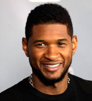 Usher defends protege Justin Bieber