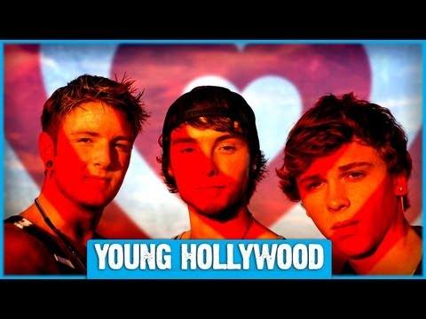 Emblem3 band members with Young Hollywood pose on a red carpet at an event