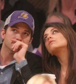 Ashton Kutcher and Mila Kunis man the phone bank for Red Nose Day