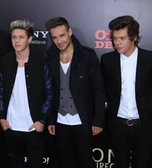 One Direction sign big money deal with Simon Cowell