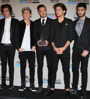 One Direction battle technical faults on live TV