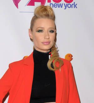 Iggy Azalea granted injunction to block distribution of early songs