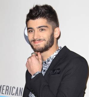 One Direction accept MTV EMAs without ill Zayn Malik
