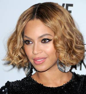 Beyonce and One Direction auction shoes for charity