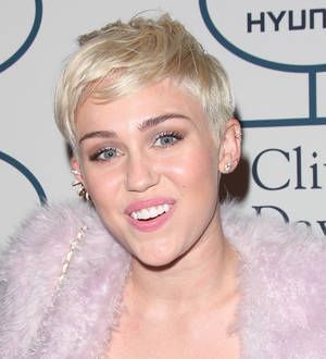 Miley Cyrus blasts unkind critics from sick bed