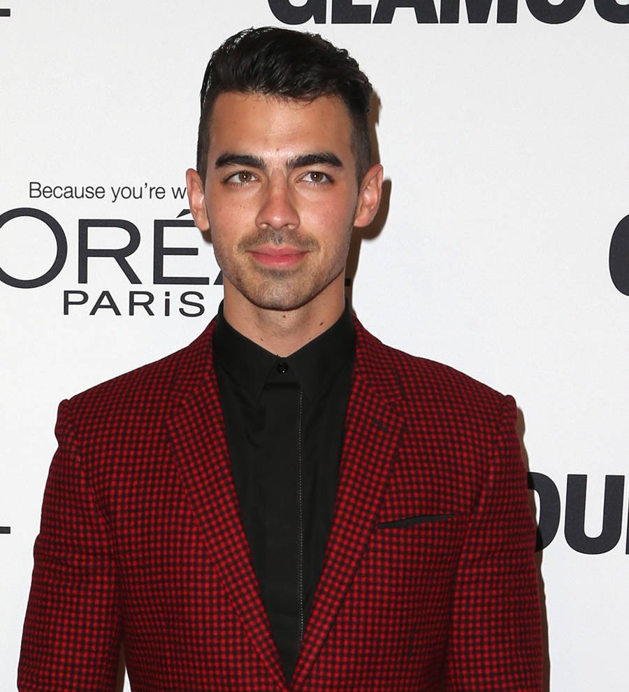 Joe Jonas and Charlotte McKinney strip down for Guess campaign