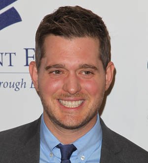 Michael Buble apologises for upsetting fans with sexy butt shot